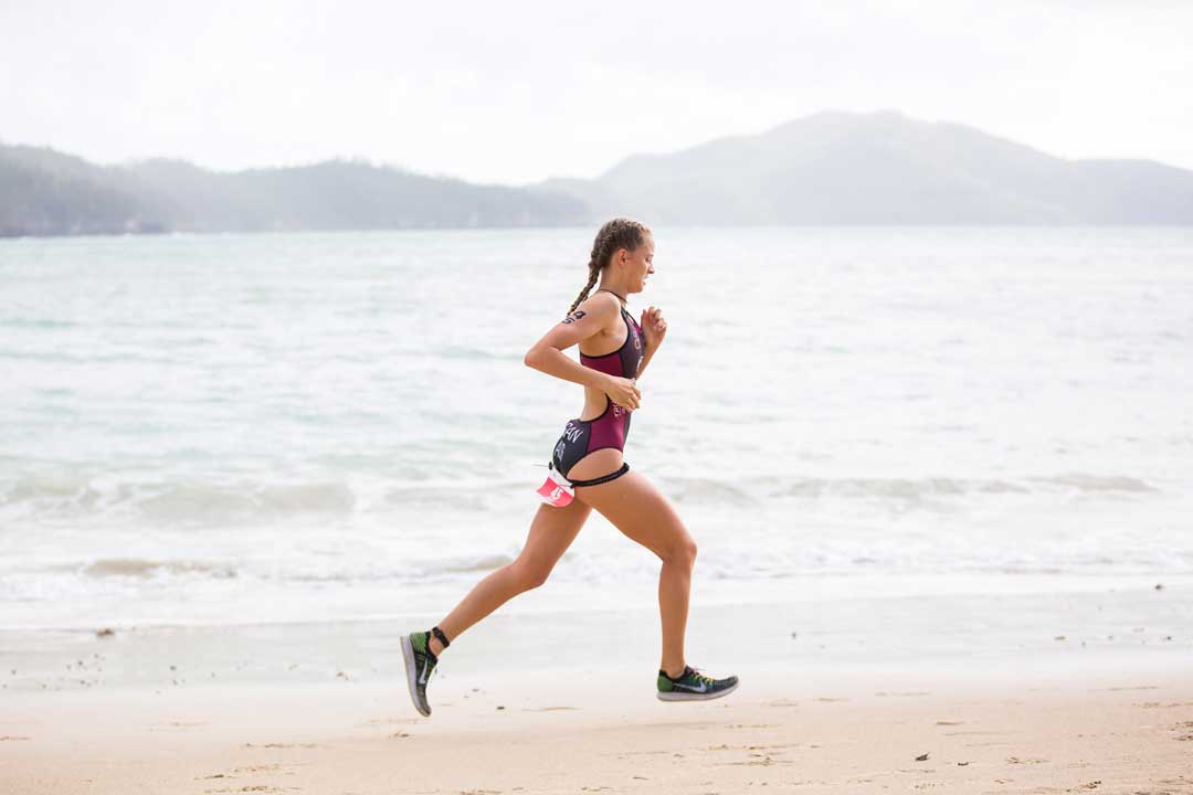 lady running at the beach