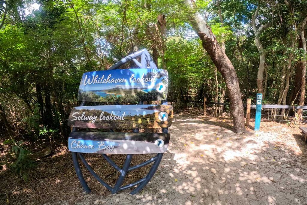 Sign located on Whitehaven Beach to give directions to the South Whitehaven Lookout